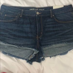 American Eagle “Tomgirl shortie” denim shorts